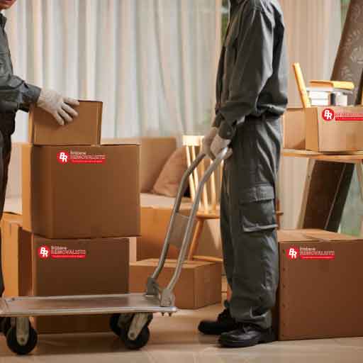 Moving Office service image of professionals loading boxes