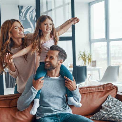 Image of a happy family in thier new apartment