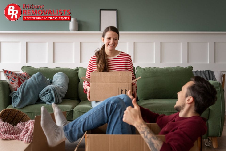 Packing Techniques for moving article image of a couple playing while they pack