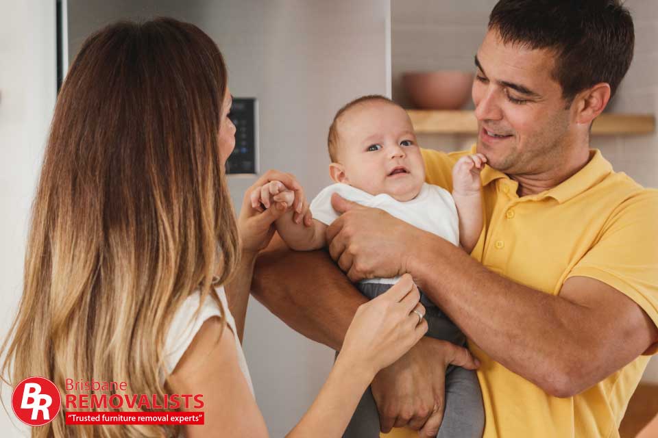 How Relocating Can Strengthen Family relocating closer to family article image of parents with their baby