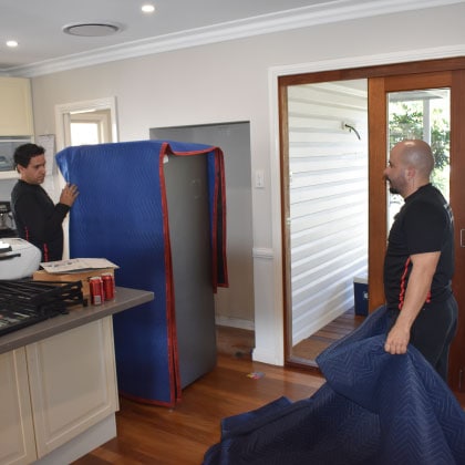 Moving services Brisbane page image of our crew preparing to move a fridge