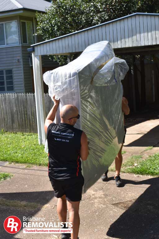 Removalists Ipswich image of our team moving a bed