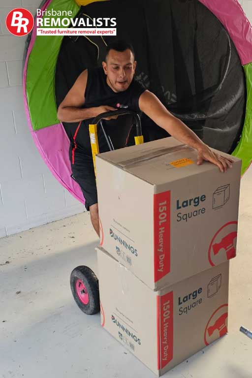 Removalists Cleveland Removalists Cleveland image of a mover loading a trolley